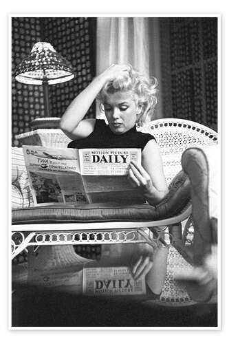 Marilyn Monroe reading a newspaper